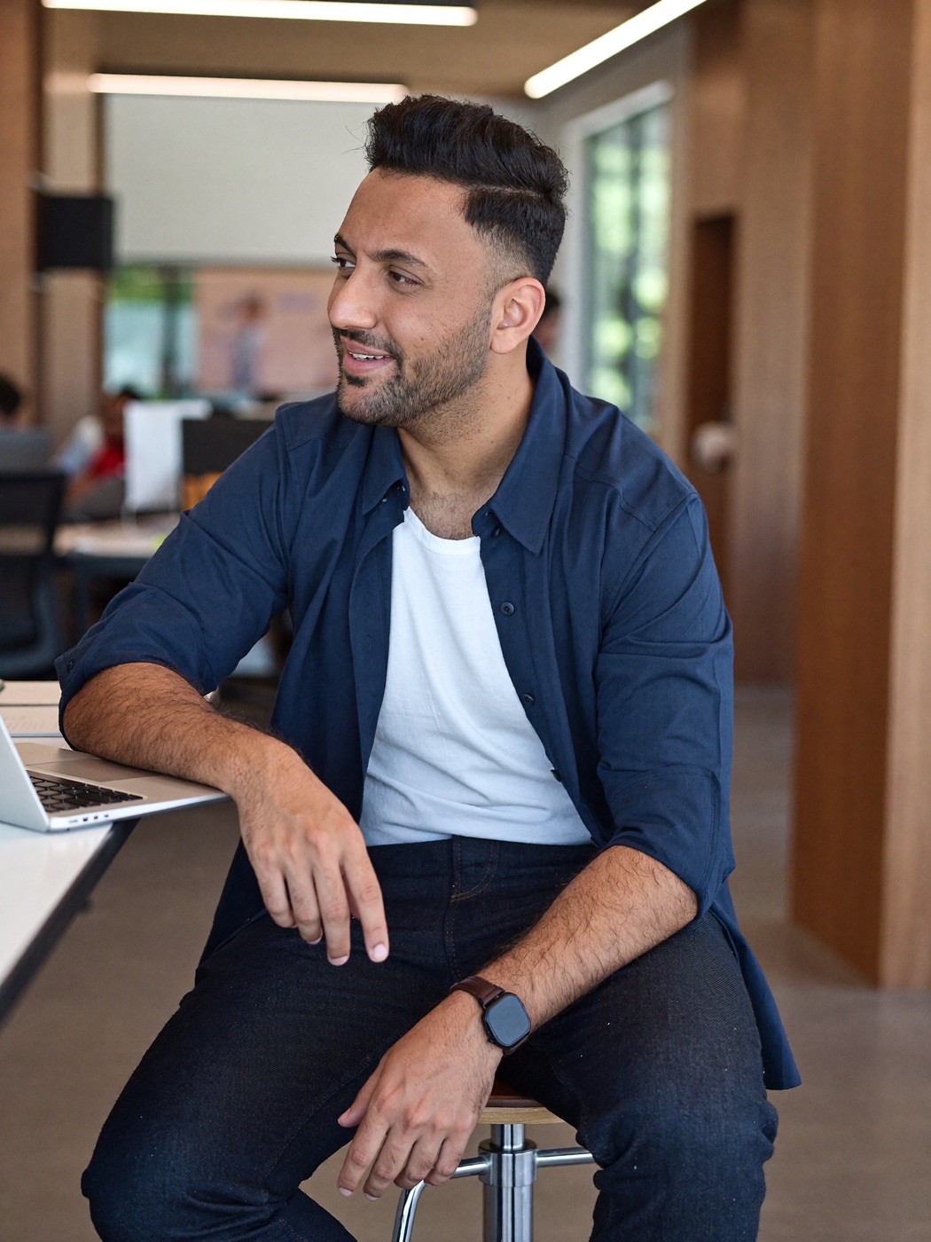 At a desk with a laptop